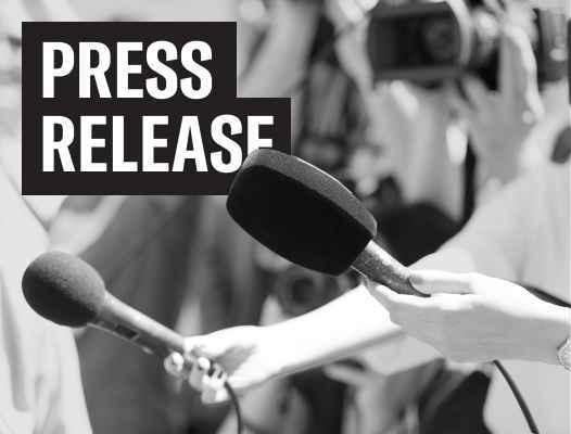 Black and white image of someone holding microphone with bold text reading "Press Release"