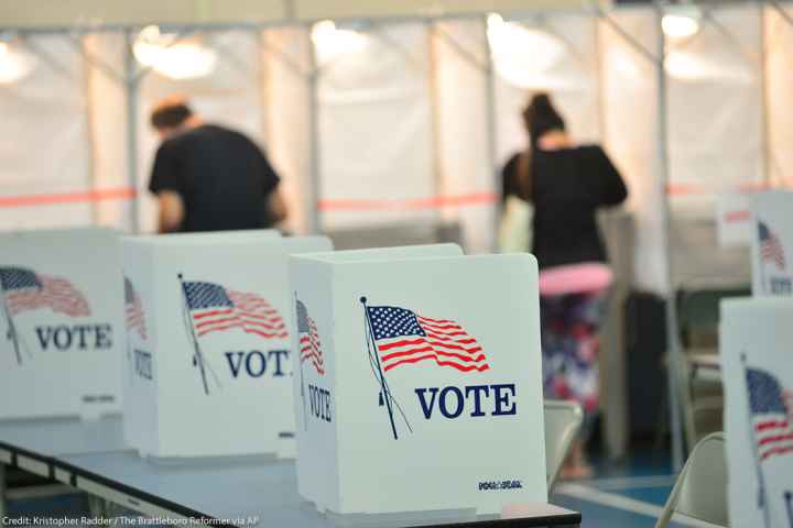 Voting booths are kept socially distant at a New Hampshire polling site.